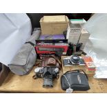 Various vintage cameras, Hanimex 75-300mm lens, Miranda flash gun, Chinon binoculars,