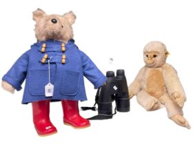 Paddington Bear, Steiff Monkey, and pair of Swarovski binoculars.