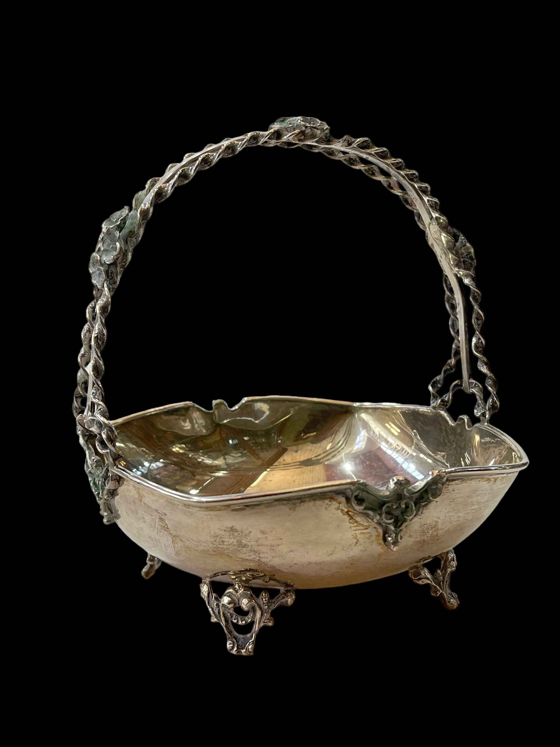 Sterling silver bon bon basket with ornate handle and feet, 13.5cm across.