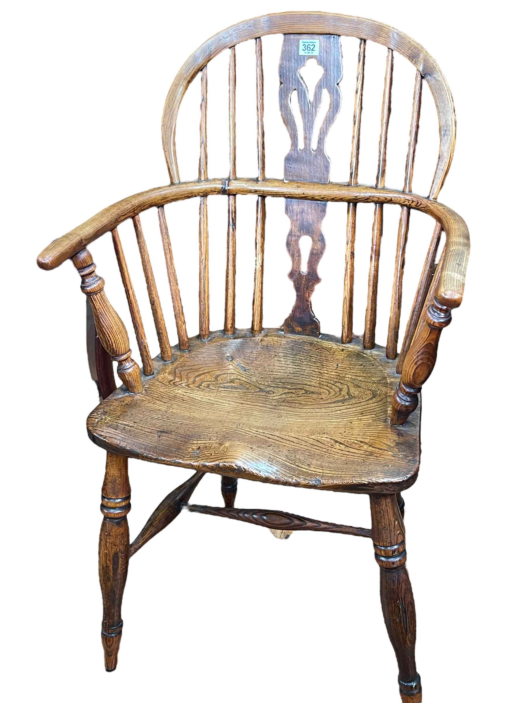 Windsor pierced splat back elbow chair.