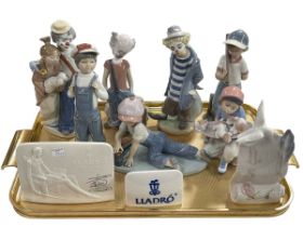 Three Lladro Clowns, four Boy Figures and three Advert Signs including Pals Forever,