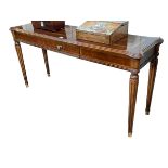 Rectangular walnut console table on turned reeded legs, 68.5cm by 138cm by 41cm.