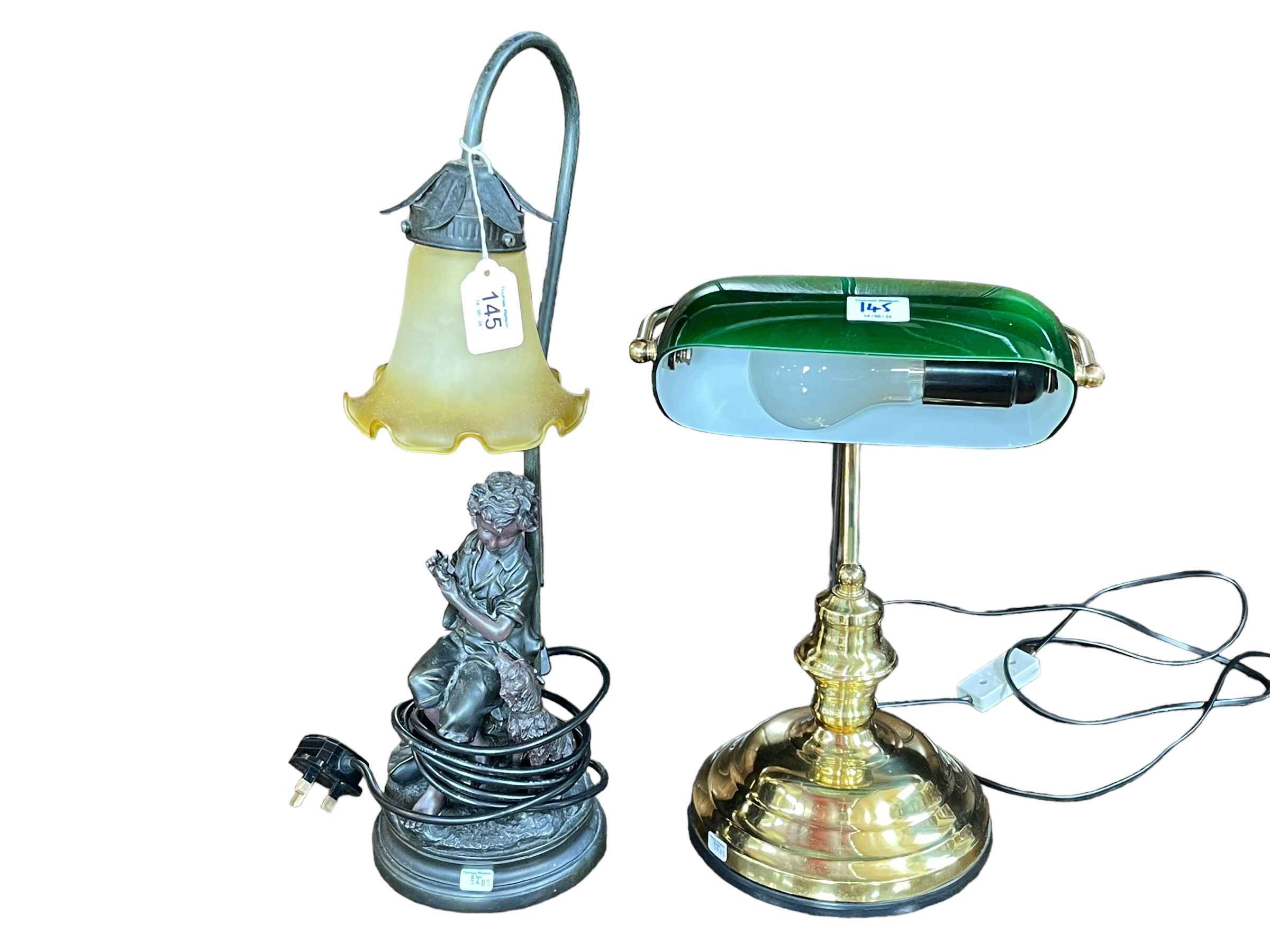 Brass desk lamp with green shade and a figural lamp with shade.