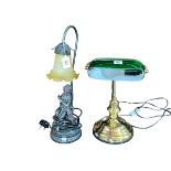 Brass desk lamp with green shade and a figural lamp with shade.