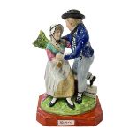 Antique Staffordshire figure group 'Return', 22cm.