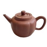 Yixing red ware teapot.