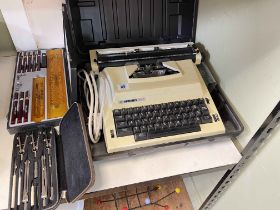 Vintage Hermes 505 electric typewriter, cased drawing instruments and writing set.