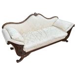 Regency style carved mahogany framed sofa in light classical fabric.