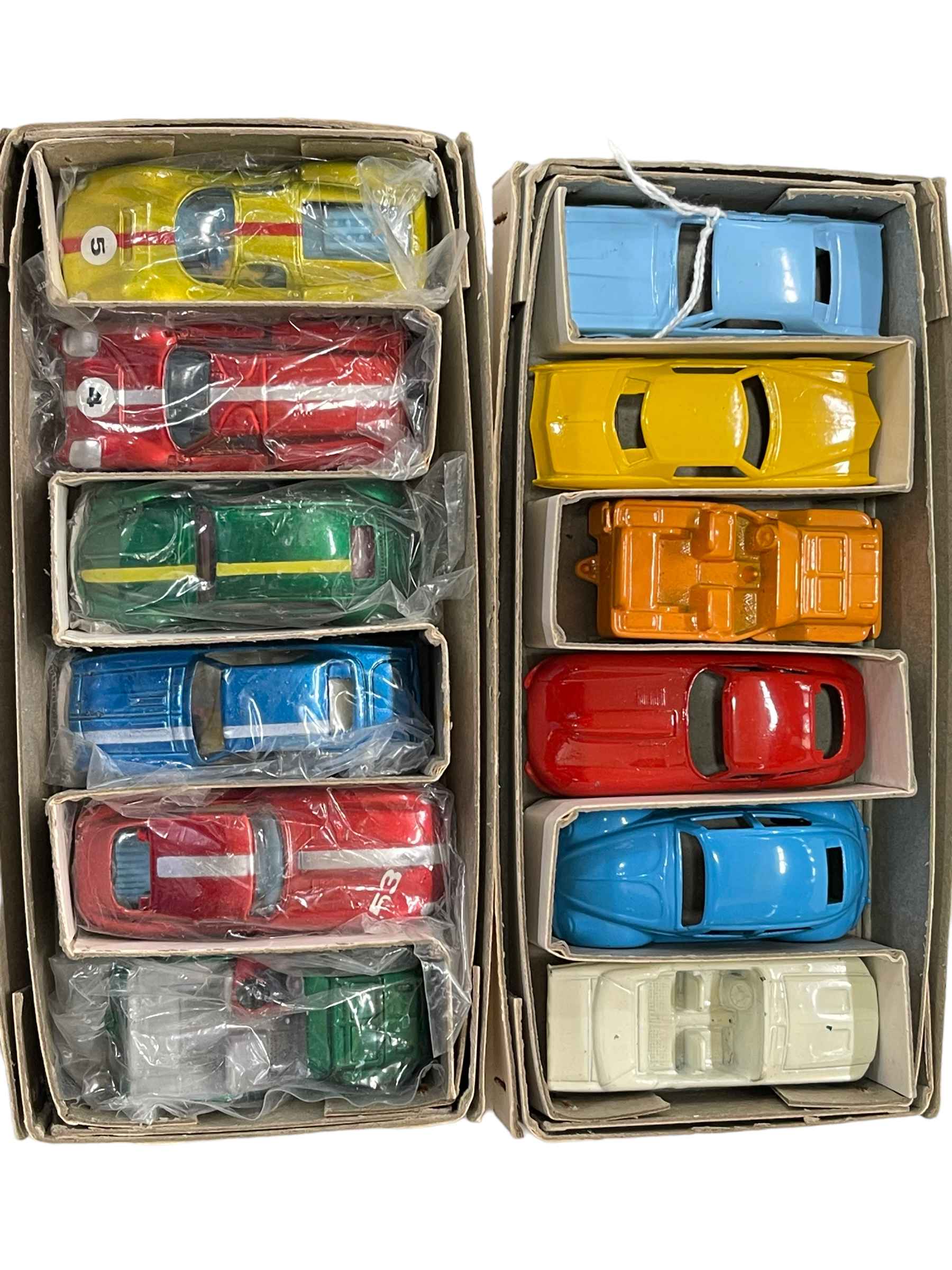 Two boxes of six Marx miniature car models.