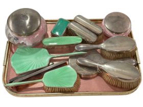 Two silver topped powder bowls and collection of silver and silver & enamel backed brushes and