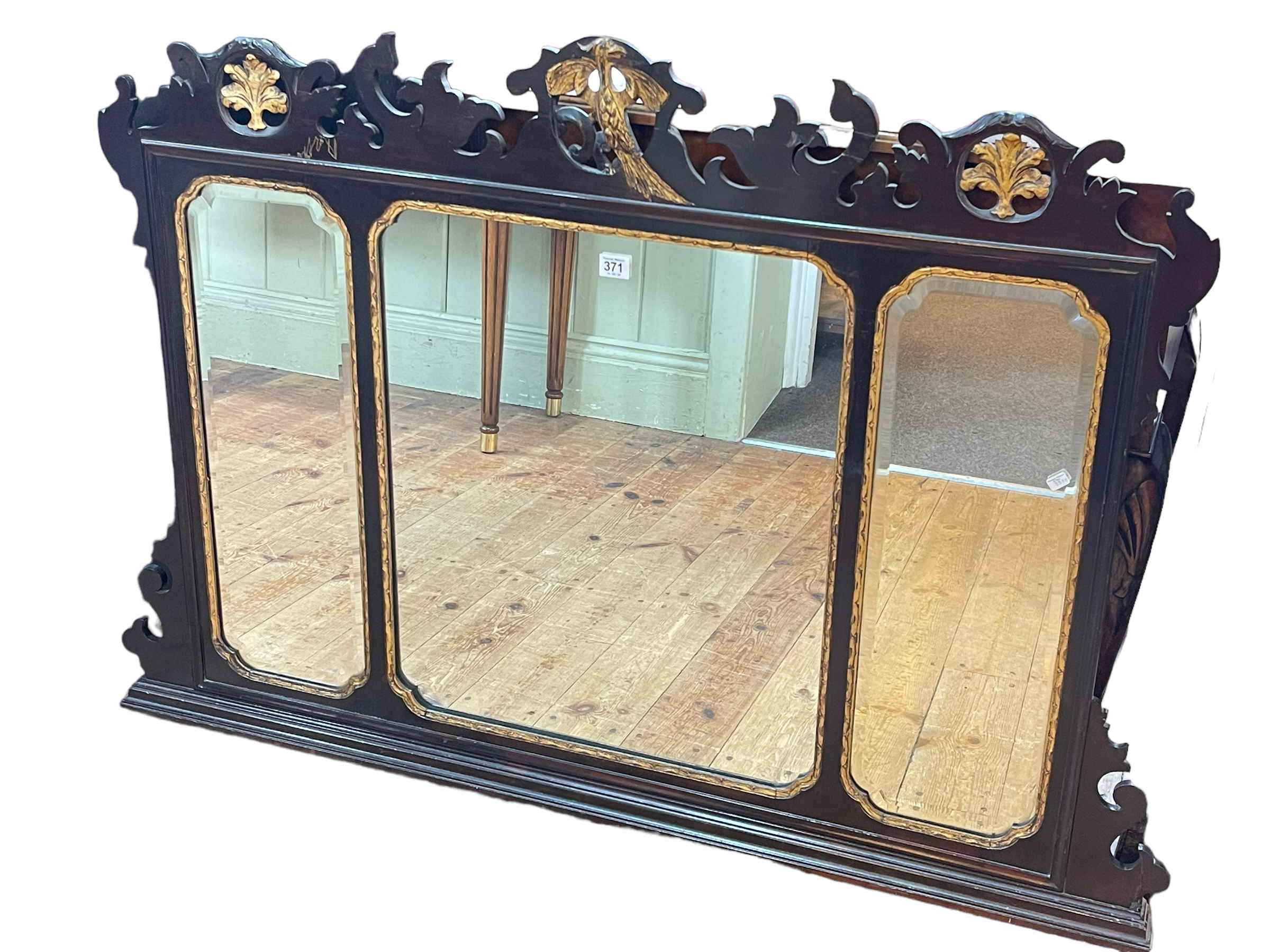 Georgian fretwork and gilt painted triple mirrored panel overmantel, 85.5cm by 124cm.