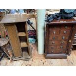 Mahogany eight drawer Wellington chest and oak finish revolving bookcase/CD rack.