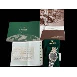 Rolex Oyster Perpetual Date stainless steel wristwatch with black baton dial, case 34mm diameter,