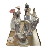 Seven Lladro figures including Ballet Dancer, Afternoon Promenade, Parisian Lady and Geisha Girl.