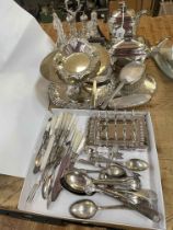Assorted silver plate and cutlery including cruet, teapot and coffee pot, toast rack, etc.