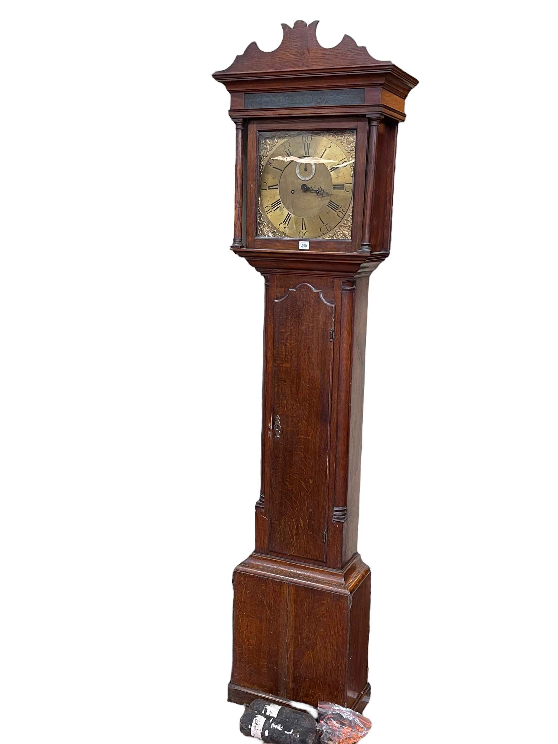 Antique oak eight day longcase clock having square brass dial, 217cm.