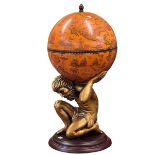 Cocktail globe on figural pedestal base.