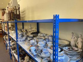 Full shelf of china including tea sets, dinnerware, toilet jugs, ornaments.