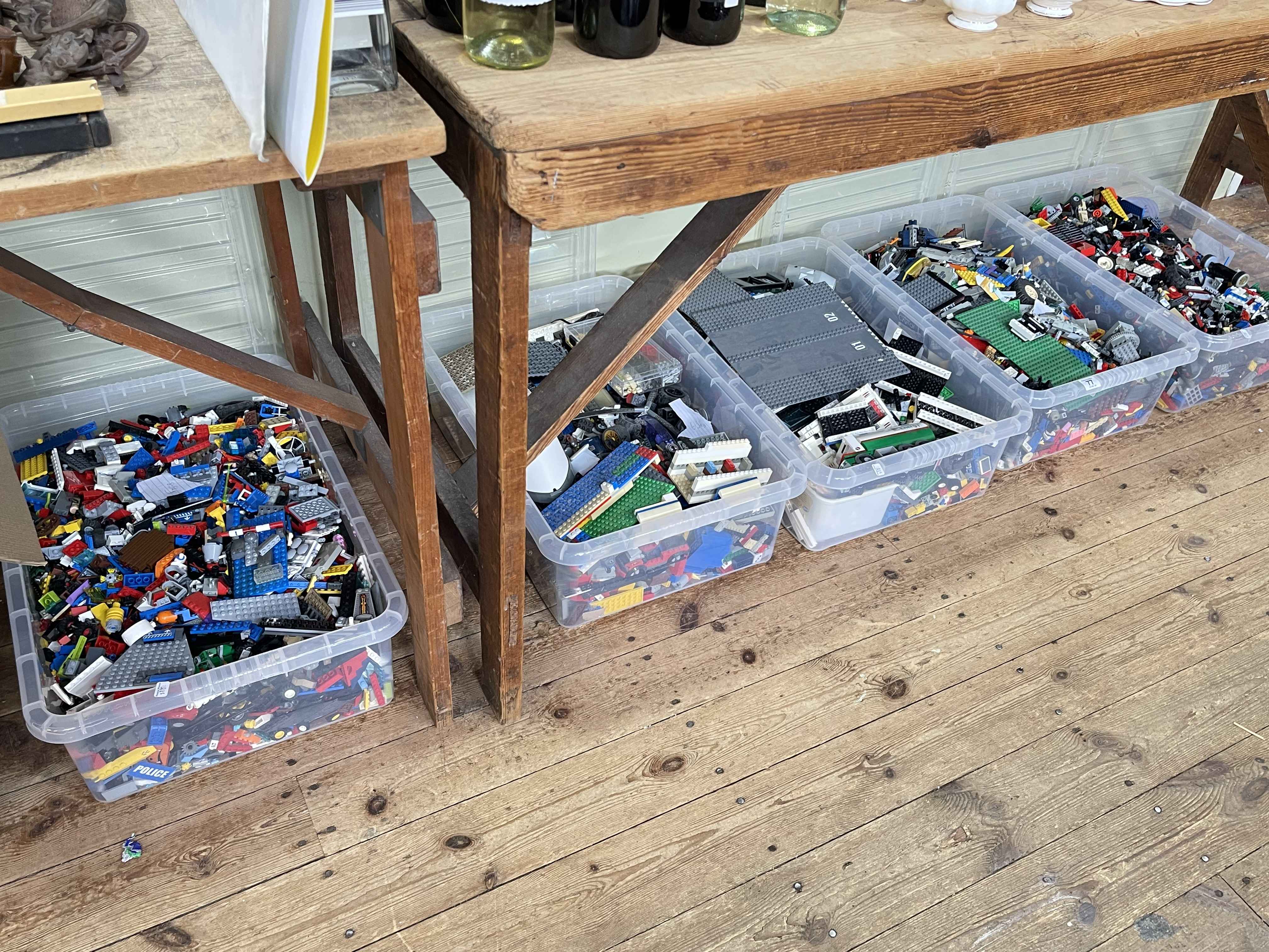 Five boxes of assorted Lego.