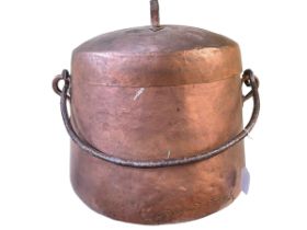 Beaten copper lidded bucket, 42cm high.