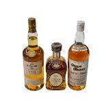 Three bottles of whisky; Cardhu Gold Reserve, Glenlivet Nadura 16 year aged, and Glen Garry.