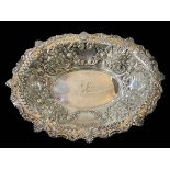 Edwardian silver basket, pierced and embossed, Sheffield 1908, 31cm across.