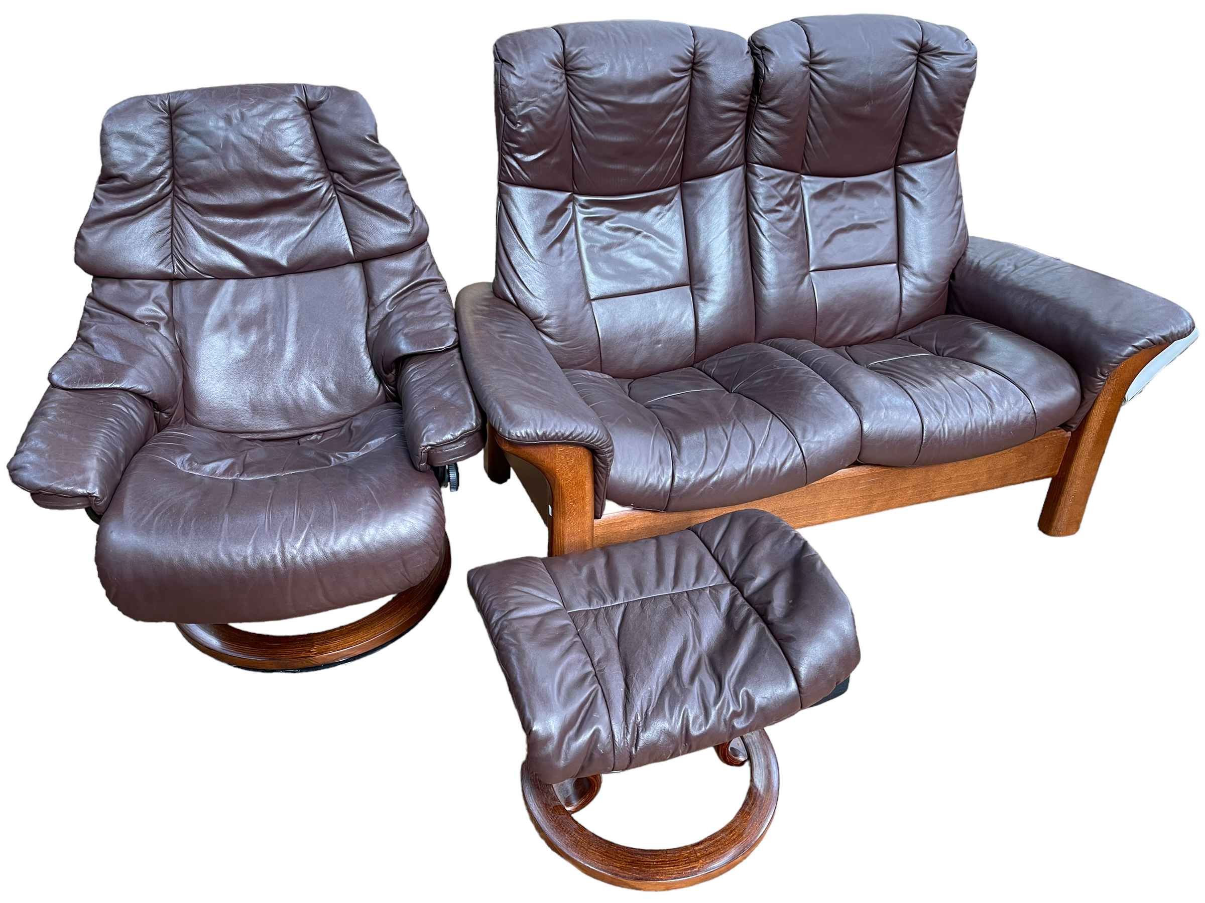 Stressless chocolate brown leather two seater reclining settee, adjustable chair and footstool.