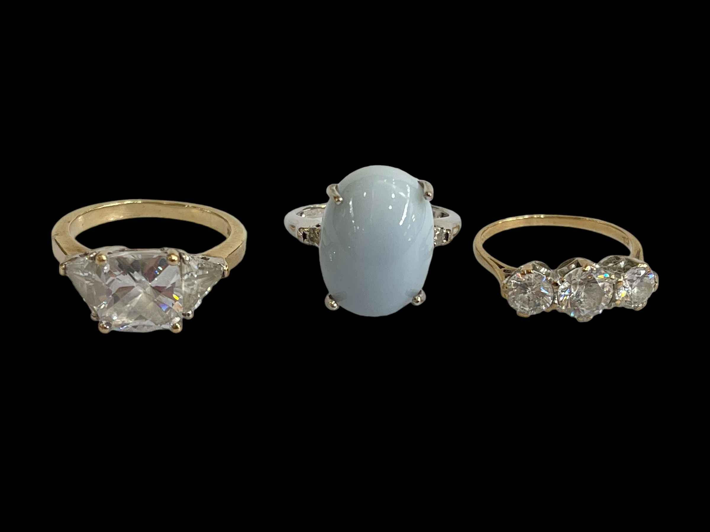 Three 9 carat gold gem stone rings.