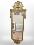 A late 19th century gilt gesso mirror,
