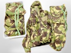 Three boxes of assorted woodland camouflage clothing,