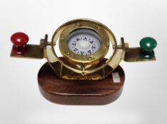 A ship's compass on stand,