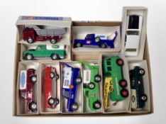 A collection of Corgi and Matchbox die cast vehicles in facsimile boxes
