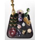 A gilt green glass bottle with stopper and six matching cups, carved onyx figure of a camel,