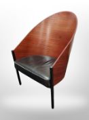 A curved laminated ply and black leather Costes armchair designed by Philippe Starck,