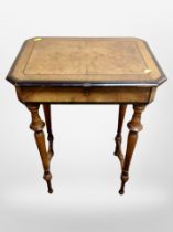 A 19th century Danish figured walnut and ebonised work table with compartmentalised interior,