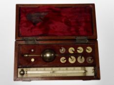 A Victorian Hydrometer in inlaid mahogany case