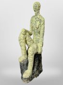 A contemporary pottery figure of a seated man, height 45 cm,