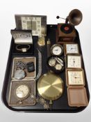 A group of travel clocks, clock pendulum, wrist and pocket watches, miniature musical gramophone,