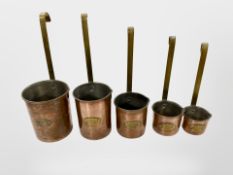 Five Victorian copper and brass measures,