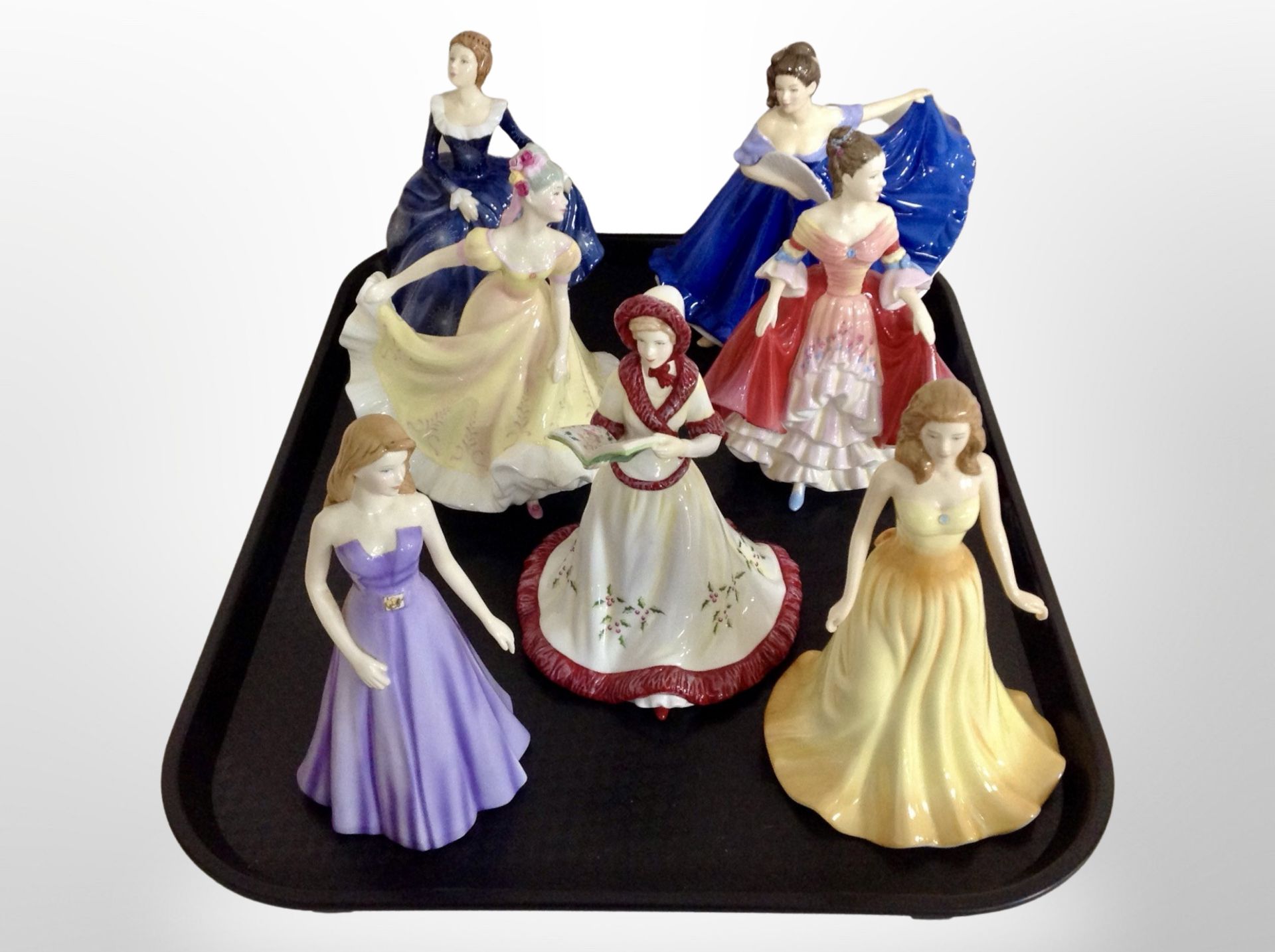 Seven Royal Doulton figurines,