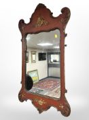 A 19th century painted mirror in the Chippendale style,