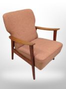 A 20th century Danish teak framed armchair
