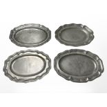 Four 19th century pewter plates,