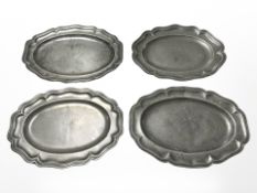 Four 19th century pewter plates,