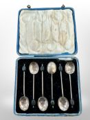 A case set of six silver coffee spoons