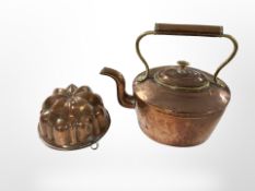 A Victorian copper kettle and a jelly mould