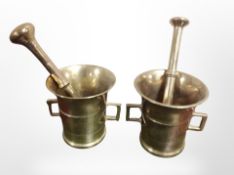 Two brass pestles and mortars
