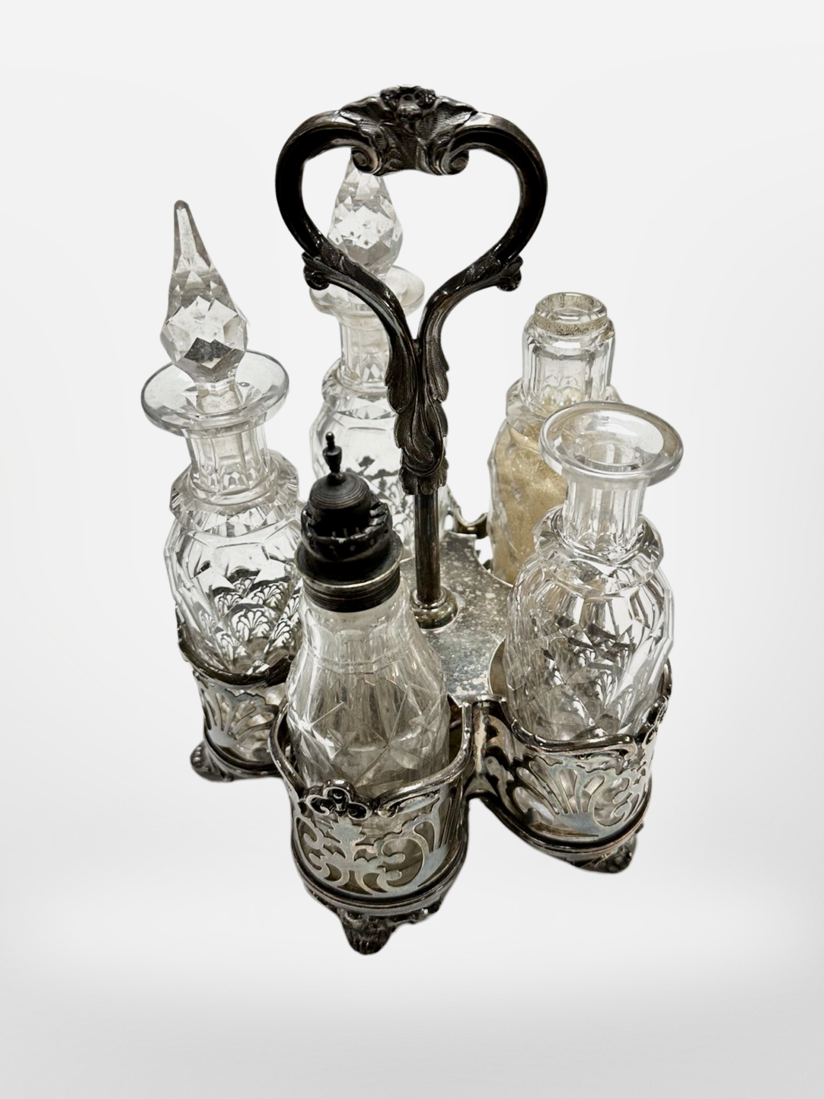 A 19th century silver plate and crystal cruet,