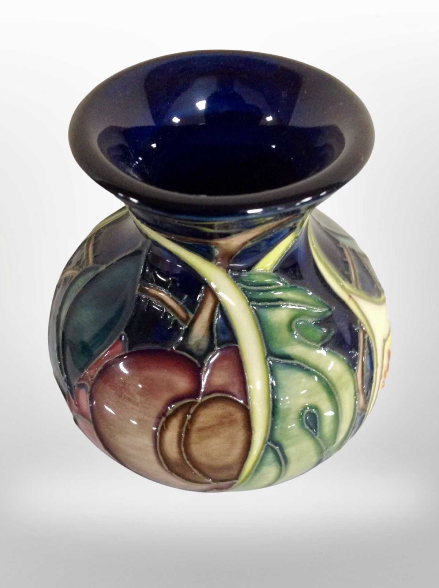 A Moorcroft squat vase, height 9.