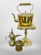 A Victorian brass kettle on trivet,